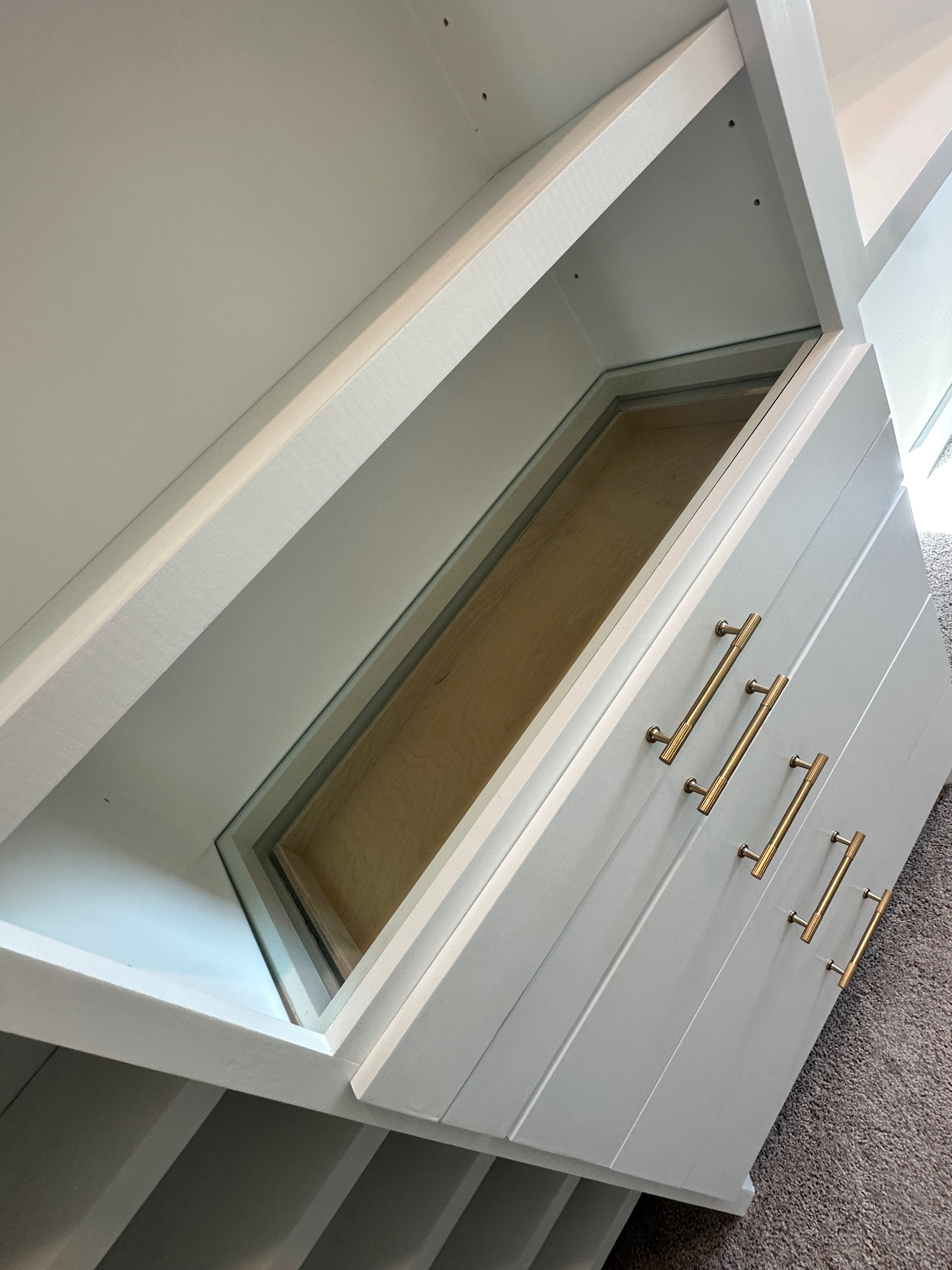 Soft Sage Closet Drawers by Rodriguez Cabinets in Houston