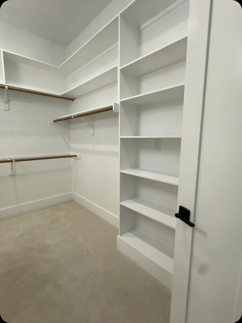 Custom Closet Shelving System by Rodriguez Cabinets in Houston