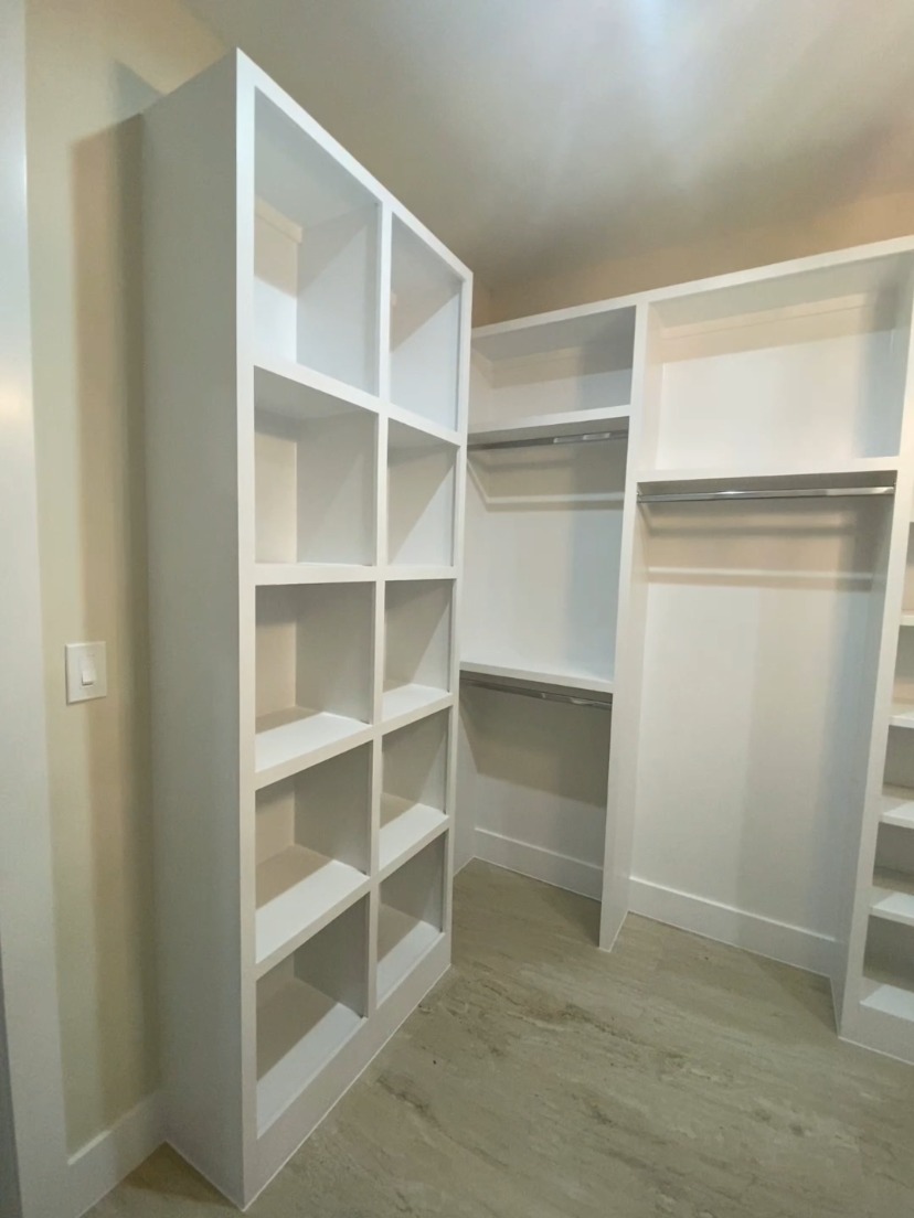 Full Storage Organization Wall by Rodriguez Cabinets in Houston