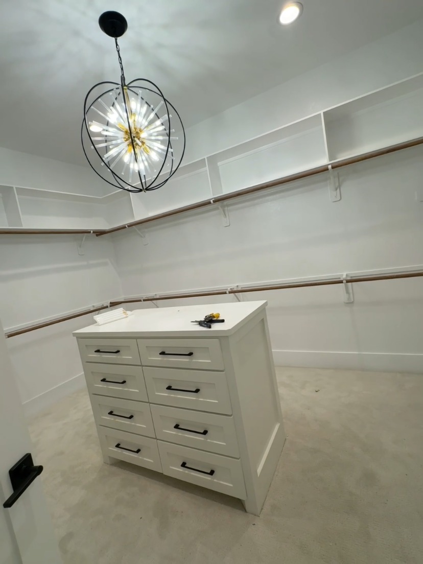 Walk-In Closet Suite (Center Island) by Rodriguez Cabinets in Houston