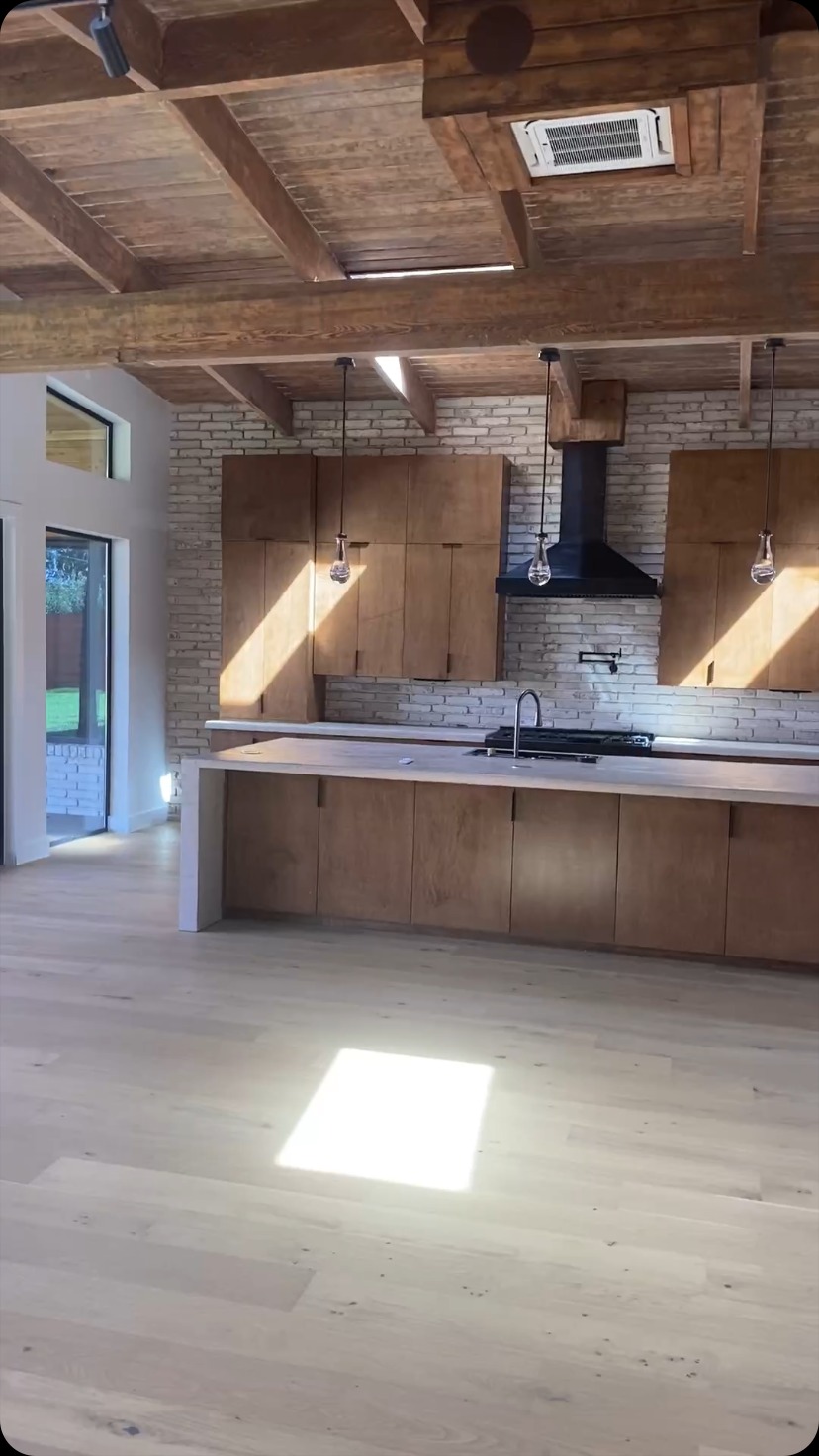 Gourmet Open Kitchen by Rodriguez Cabinets in Houston