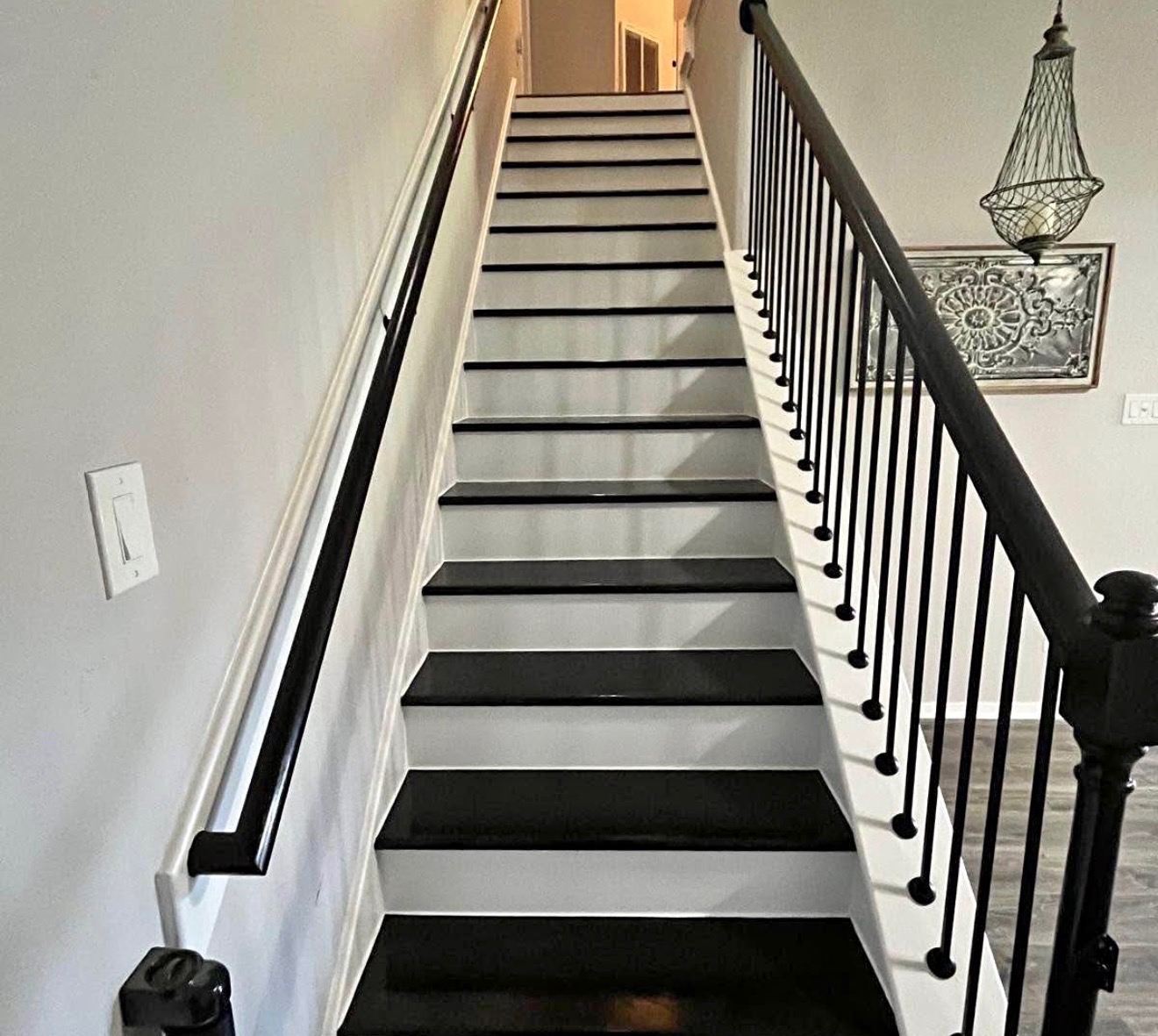 Black & White Staircase Remodel by Rodriguez Cabinets in Houston