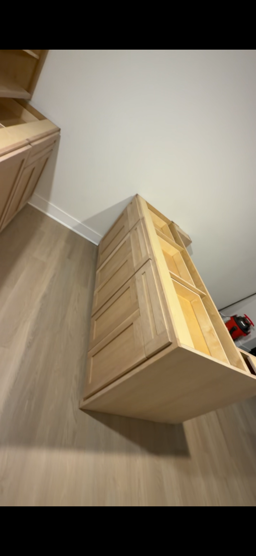 Custom maple drawer bank with open side shelving by Rodriguez Cabinets in Houston