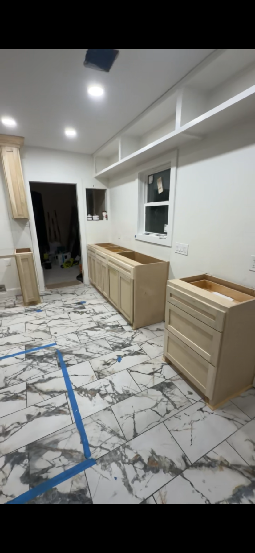 Maple kitchen wall with shaker base cabinets and display shelving by Rodriguez Cabinets in Houston